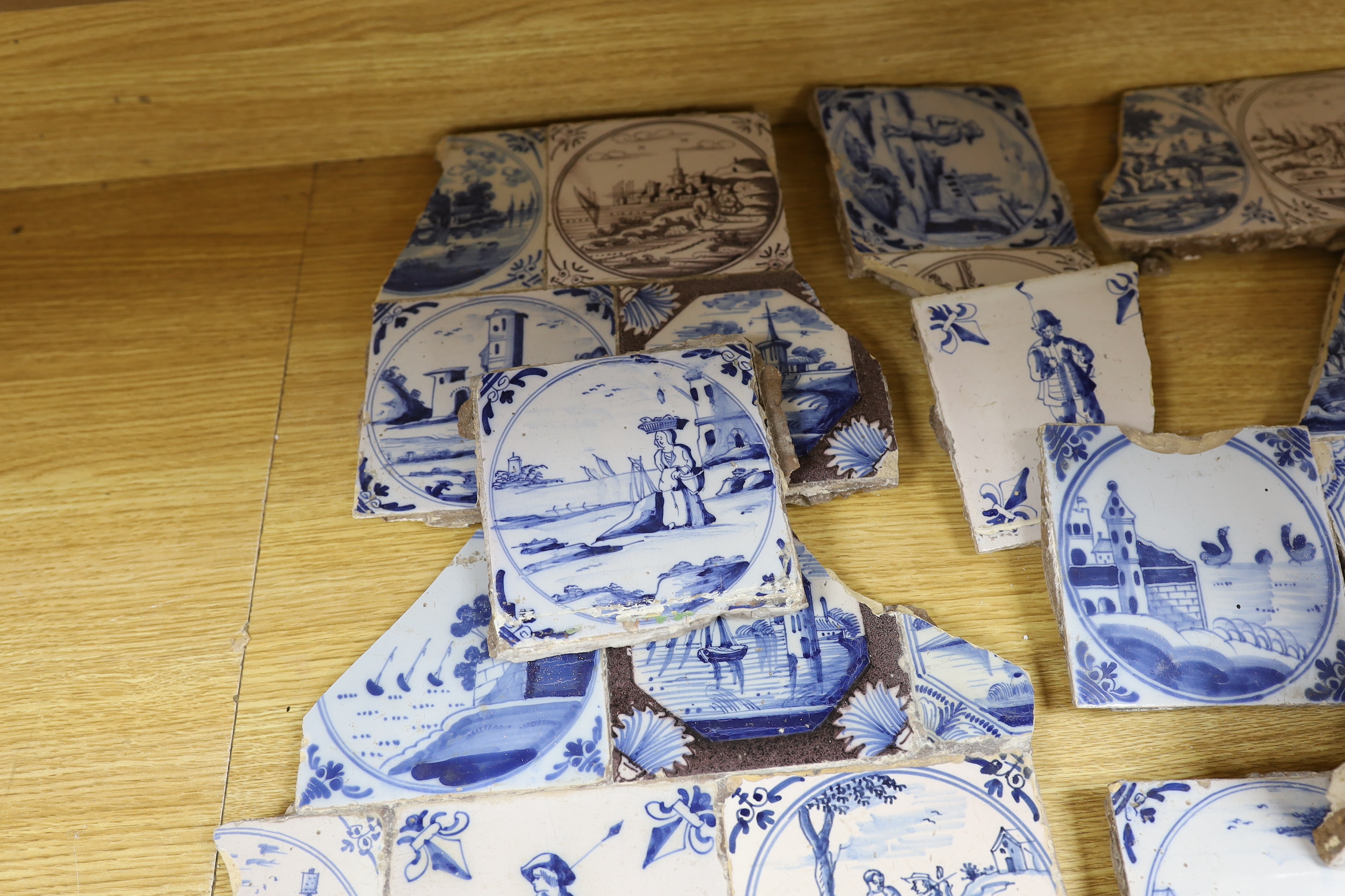 A collection of 18th century Delft Blue and white or manganese tiles (a.f.)